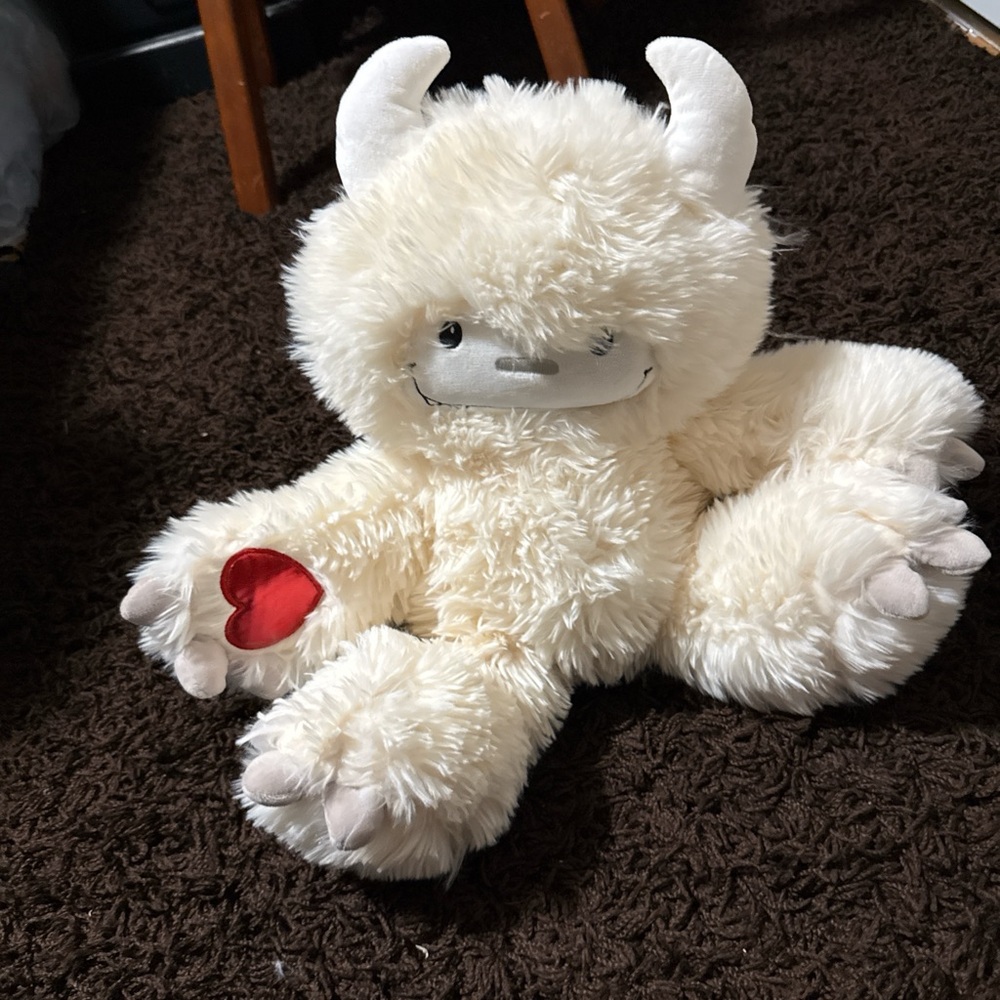 Adorable Cream Plush Monster Toy with Red Heart
